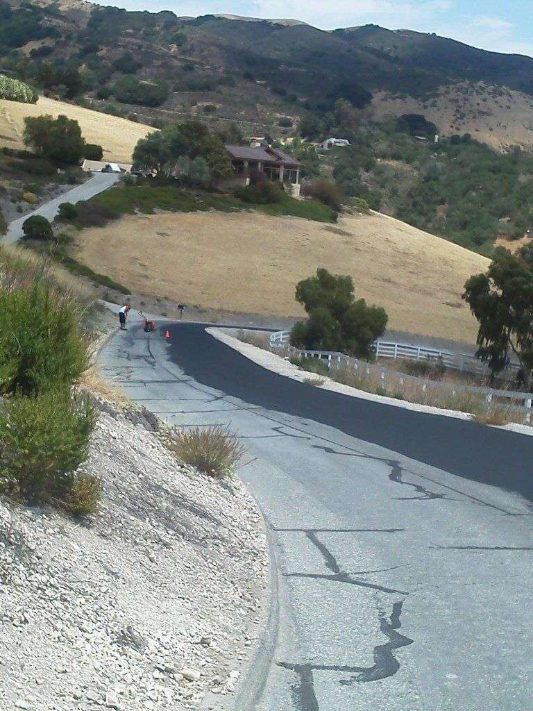 Hillside road overlay in progress.