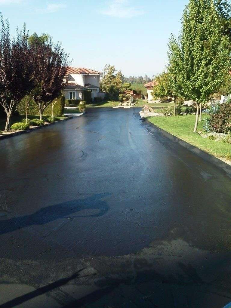 Estate street after a fresh sealcoat.